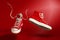 Flying sneakers on red background. Sport shoes or trainers isolated. Athletic shoes. fitness, sport, training concept