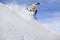 Flying snowboarder on mountains. Extreme winter sport.