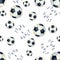 Flying soccer ball on the background of watercolor stains, splash with the inscription score a goal. Seamless pattern