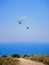 Flying tandem paragliders in the sky over the sea and near the mountains, beautiful sea view 06