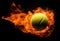 Flying tennis ball in flames on pure black background