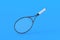Flying tennis racquet on blue background. Sports equipments. International tournament