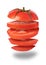 Flying tomato on white background