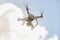 Flying unmanned quadcopter with video camera