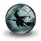 Flying Witch silhouette in misty blue crystal ball