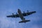 Flyover of a C-130 Hercules Airplane