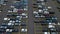 Flyover drone view top down on parked cars ready for shipping distribution side