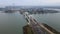 Flyover drone view top down on parked cars ready for shipping distribution turning in a circle