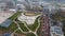 Flyover drone view top down on parked cars ready for shipping distribution turning in a circle