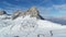 Flyover mountain in the alps. Mount nuvolau in winter. Aerial in the dolomites