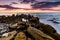 Flysch rocks in Barrika beach at the sunset. Travel in Spain.