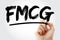 FMCG - Fast Moving Consumer Goods acronym with marker, concept background