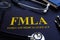 FMLA family and medical leave act and stethoscope.