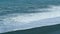 Foam Blue And Green Waves On Gray Sand. Choppy Sea Captured With Telephoto Lens. Rough Sea With Storm. Real time.