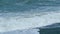 Foam Blue And Green Waves On Gray Sand. Choppy Sea Captured With Telephoto Lens. Rough Sea With Storm. Slow motion.