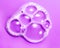 Foam soap bubbles on purple background. Liquid soap bubble, Froth background, top view. Soap foam popping