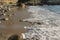 foam from waves in a Cantabrian beach in Spain