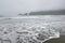 Foaming waves in the mist at Florencia Beach, Pacific Rim National Park