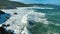 Foamy Crashing Sea Waves On The Rocky Shore In Playa de Valcobo In Arteixo, A Coruna, Spain. Aerial Drone Shot