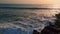 Foamy marine waves washing rocky coast aerial shot. Ripple sea splashing cliffs