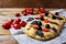 Focaccia with olive, cherry tomato and basil leaves