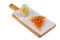 Foccacia with tomatoes and sauce on a cutting board on isolated background