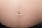 Focus on belly Pregnant Woman
