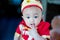 Focus cute baby boy wear red and gold chinese suit on chinese new year day.