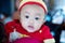 Focus cute baby boy wear red and gold chinese suit on chinese new year day.