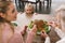 Focus of cute kid looking at tasty turkey in Thanksgiving day