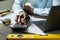 Focus on hand of African American engineer pressing buttons of calculator