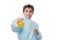 Focus on laboratory glass flask with yellow chemical solution, in the hands of a blurred smart teenage schoolboy chemist