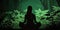 in focus long hair Woman in lotus pose in sillhouette practicing yoga in green forest