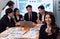 Focus portrait of asian female manger with blurred background in harmony.