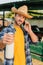 Focus of rancher in straw hat