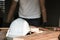 Focus at safety helmet on working desk and carpenter background