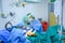 Focus on saline bottles and surgical operating room equipment in hospitals