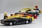 Focus-stacking with Lego figures next to a row of toy cars entirely in focus