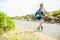 Focus on straw with hitchhiking blonde on background