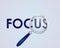 Focus  Text focused with Magnifying Glass Vector