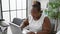 Focused african american woman worker excelling in business. working diligently at her laptop, this boss lady embodies success and
