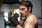 Focused boxer training in gym
