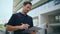 Focused director holding documents signing contract at office exterior closeup