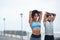 Focused on getting their bodies loose and limber. two sporty young people stretching while exercising outdoors.