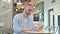 Focused Redhead Man using Smartphone in Cafe