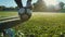 A focused shot of a players cleats maneuvering the ball on the stadiums lush green grass