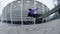 Focused skater riding on urban background. Sporty guy jumping on skate outdoor.