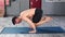 Focused strong young sports man doing yoga professionally enjoying healthy lifestyle full shot