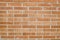 Focused texture of orange solid brick wall