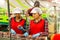 Focused women checking quality of peaches